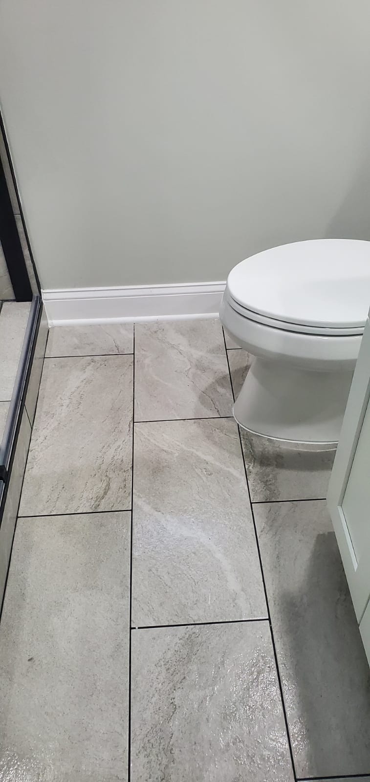 Polished Tiled Bathroom Floor and Vanity Base