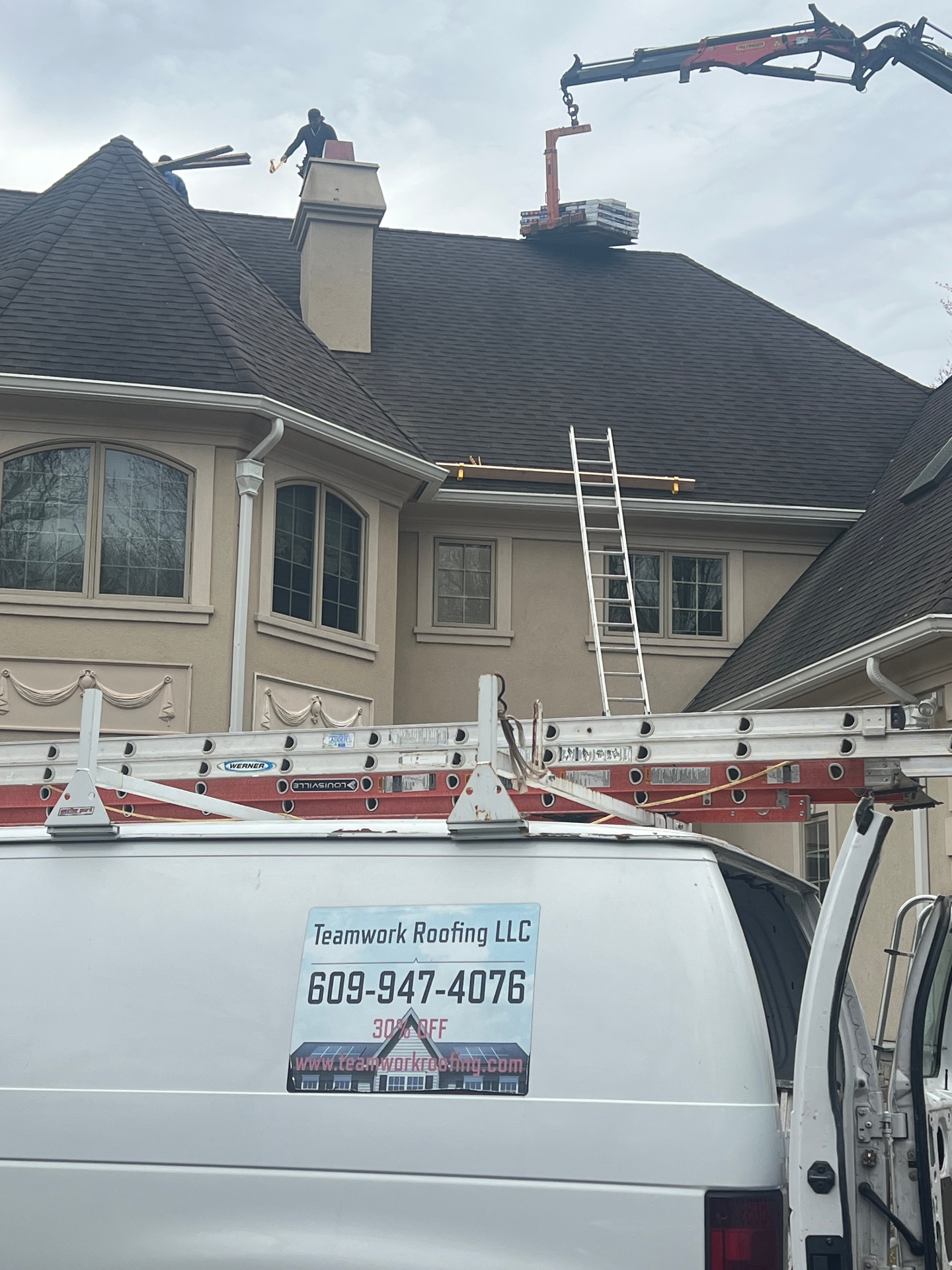 Roofing Service Truck and House